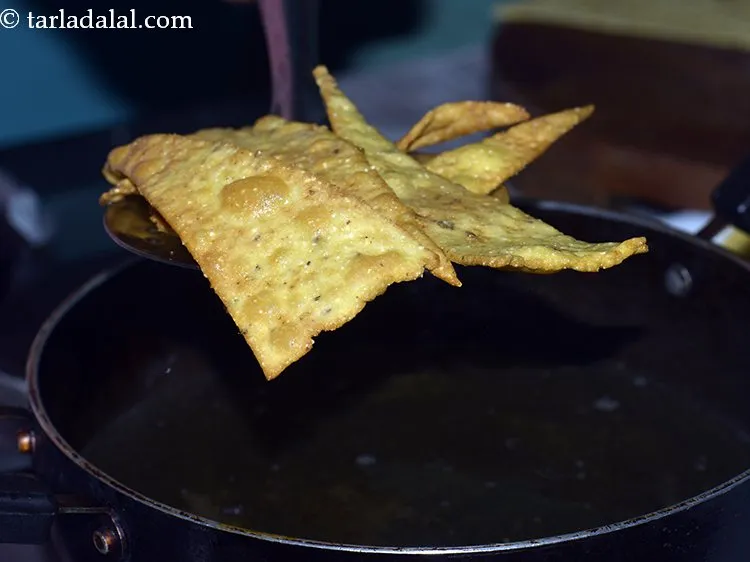 Step 16 – Deep-fry, a few chips at a time, on a medium flame till they turn crisp …