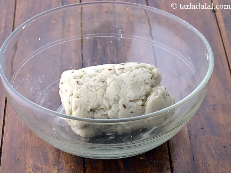 Step 12 – Transfer the mixture in a deep bowl and knead it well.
