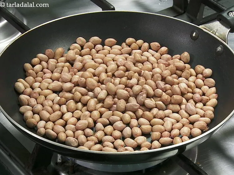 Step 3 – Add raw peanuts in a broad non-stick pan. Peanuts are a good source of protein …