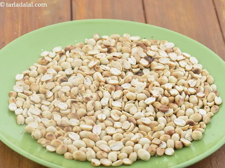 Step 5 – Transfer in a plate, cool completely so they turn crispy. De skin them by rubbing …