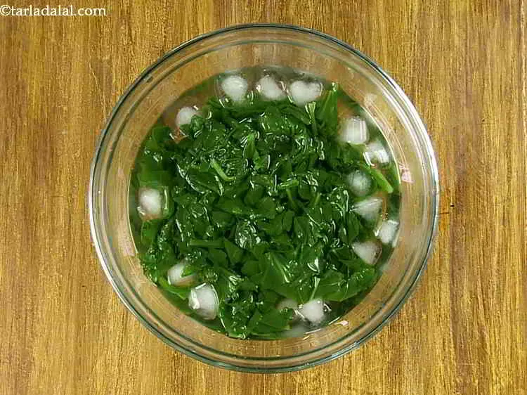 Step 3 – Do not miss out on adding blanched spinach into a bowl of cold water. This …