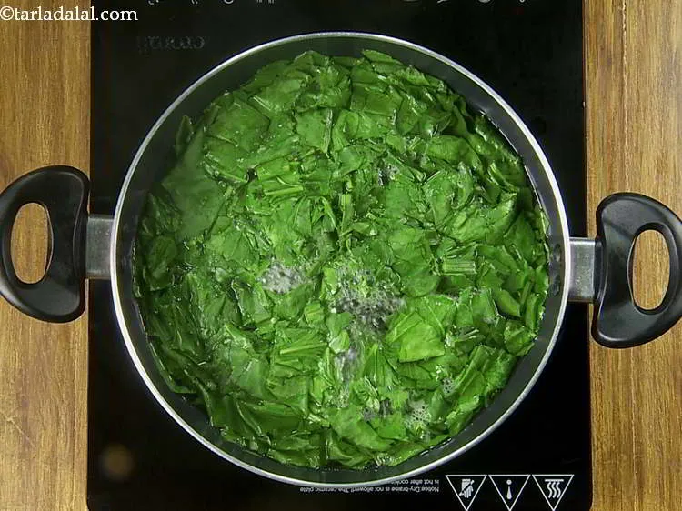 Step 28 – Mix well and cook for 2-3 minutes. Till the spinach gets tender. Do not over …