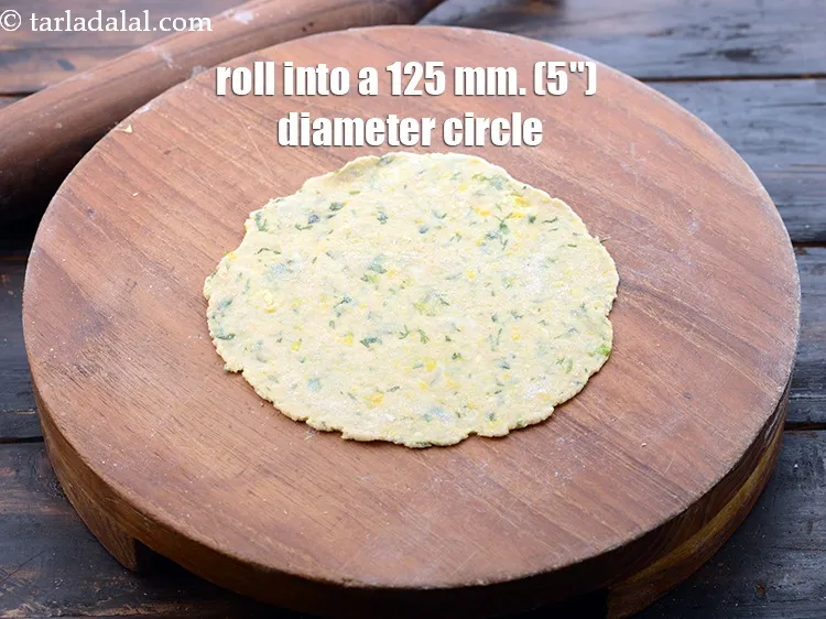 Step 24 – Roll out one portion of the dough into a 125 mm. (5&quot;) diameter circle using …