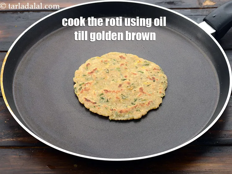 Step 27 – Cook the roti over a medium flame using little oil till it is golden brown …