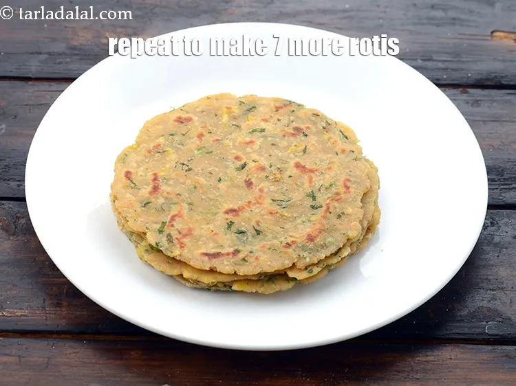 Step 28 – Repeat with the remaining dough to make 7 more rotis.