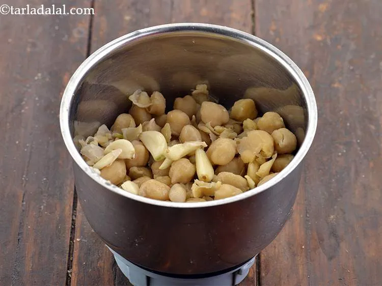 Step 12 – Add 1 tsp&nbsp;<a href="https://www.tarladalal.com/glossary-garlic-paste-lehsun-ki-paste-lahsun-ki-paste-350i">garlic (lehsun) paste</a>.&nbsp;<a href="https://www.tarladalal.com/recipes-using-garlic-348">Garlic</a>&nbsp;has been proven to&nbsp;<a href="https://www.tarladalal.com/recipes-for-Low-Cholesterol--380">lower cholesterol</a>.&nbsp;The active ingredient allicin …