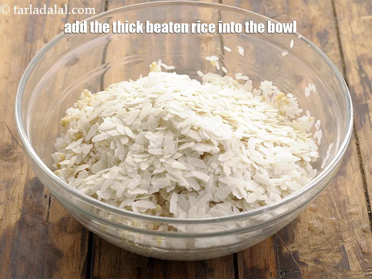 Step 16 – Put both the rice into another deep bowl. Add the thick beaten rice into the …