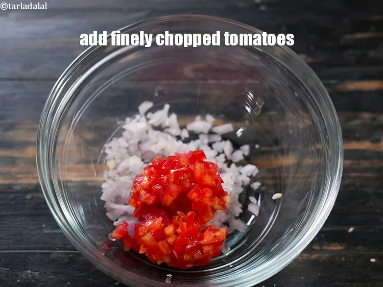 Step 4 – Add 1/4 cup finely <a href="https://www.tarladalal.com/glossary-chopped-tomatoes-779i">chopped tomatoes</a>.&nbsp;<meta charset="UTF-8" />Tomatoes add a bit of sweetness and …