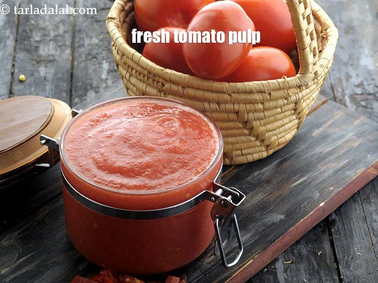 Step 8 – See <a href="https://www.tarladalal.com/fresh-tomato-pulp-homemade-tomato-pulp-38652r" target="_blank">how to make tomato pulp</a> ?