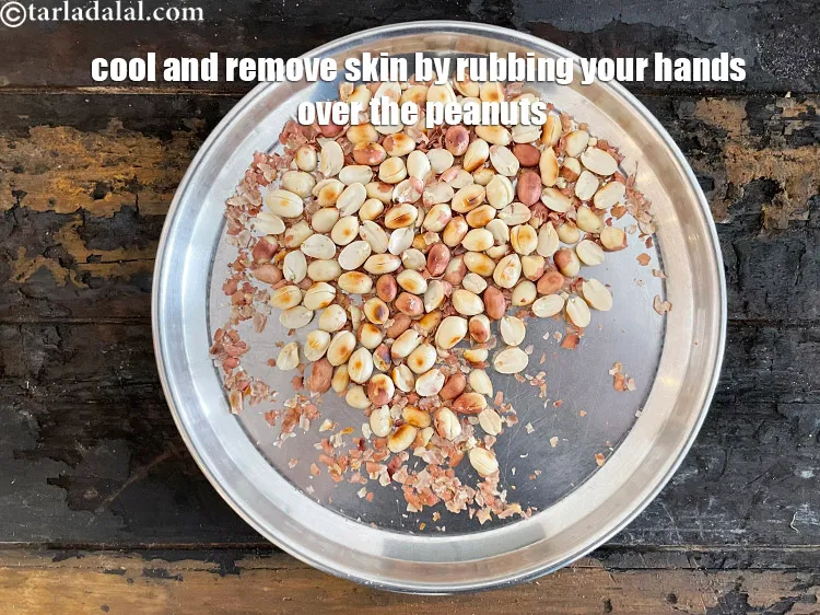 Step 12 – <meta charset="UTF-8" />Cool and remove the skin&nbsp;by rubbing your hands over the peanuts.&nbsp;<br /> &nbsp;