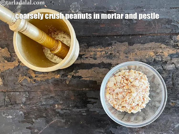 Step 7 – <meta charset="UTF-8" />Coarsely crush the peanuts in a mortar and pestle.&nbsp;<br /> &nbsp;