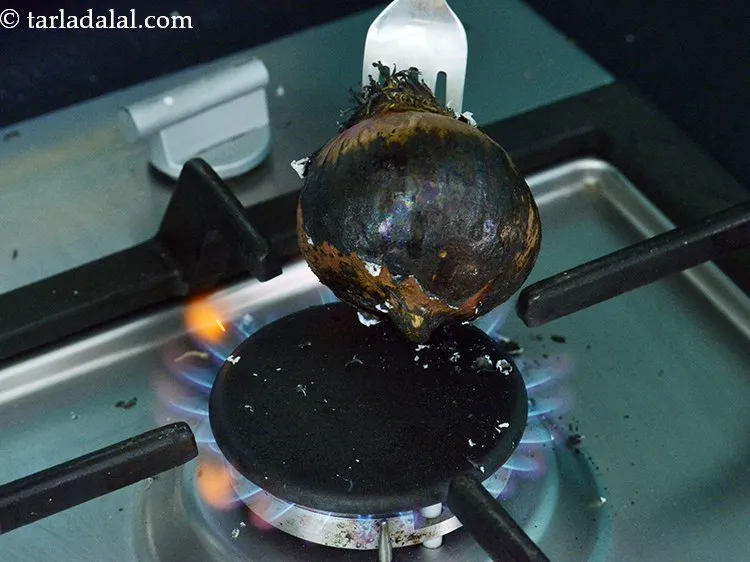 Step 6 – This is how the onion will look like after it is black from all sides. …