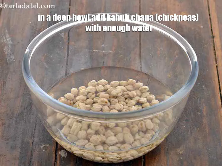Step 3 – Take a deep bowl, add slightly less than 1&nbsp;cup raw kabuli chana, wash and cover …
