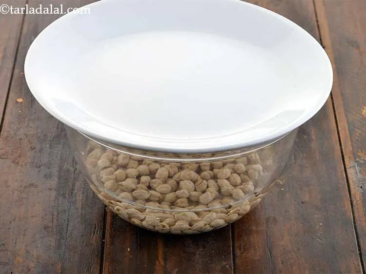 Step 4 – Cover with a lid and let it soak overnight. The chickpeas will double in size. …