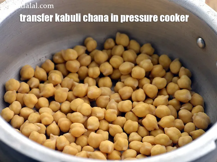 Step 24 – Transfer the soaked chana to a pressure cooker.