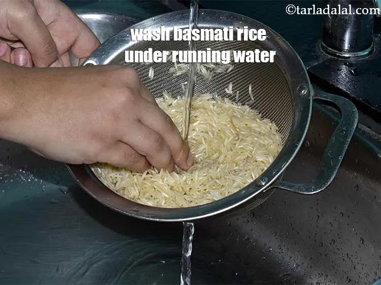 Step 4 – Wash 1 1/2 cups&nbsp;<a href="https://www.tarladalal.com/glossary-long-grain-rice-basmati-chawal-basmati-rice-535i">long grained rice (basmati)</a>&nbsp; thoroughly under running water until you get …