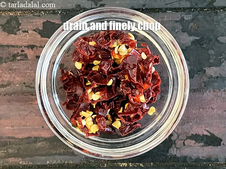 Step 28 – Drain and finely chop Kashmiri red chillies.