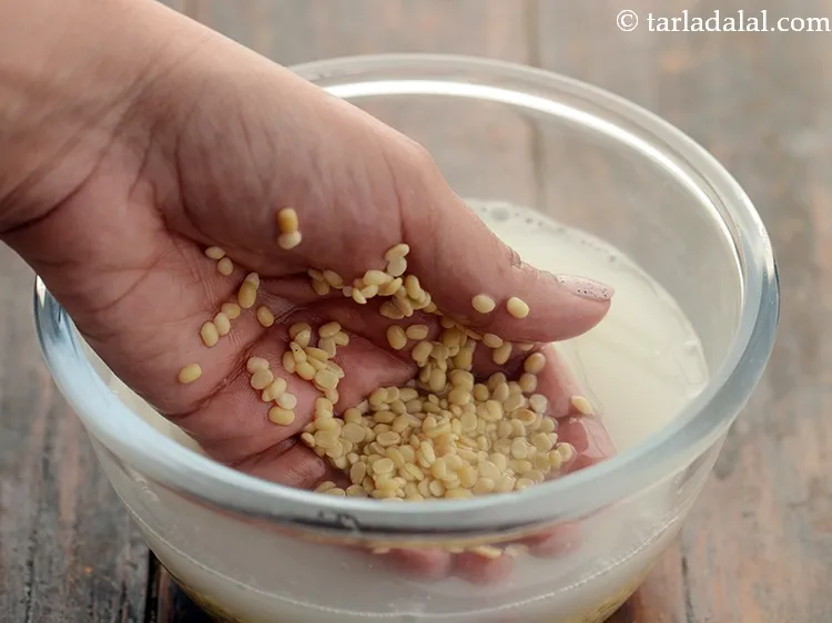 Step 4 – Clean and wash 1 cup&nbsp;<a href="https://www.tarladalal.com/glossary-urad-dal-split-black-lentil-941i">urad dal (split black lentils)</a>&nbsp;in enough water.&nbsp;