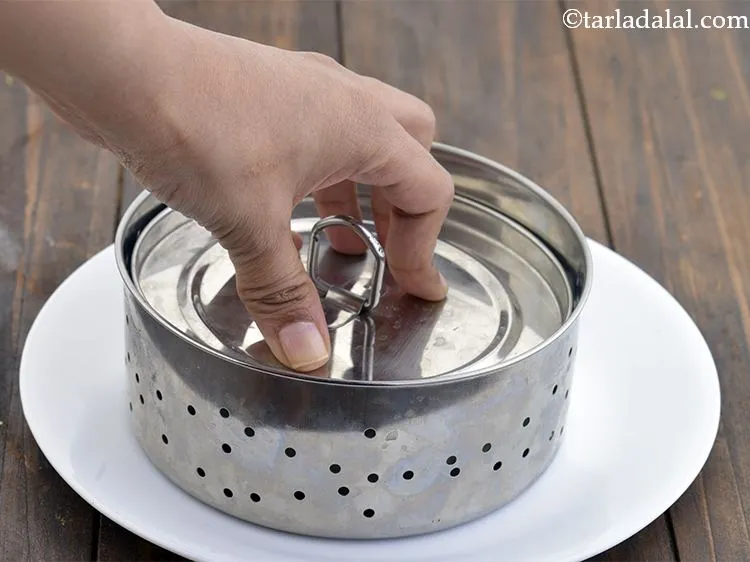 Step 35 – After step 20, take a 125 mm (5&rdquo;) paneer mould or any mould and place …