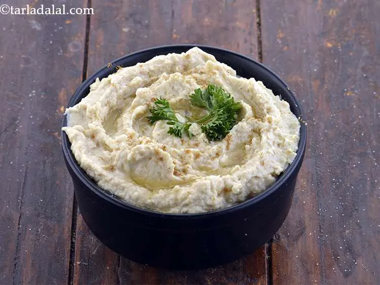Step 18 – Finally, garnish&nbsp;<b><span style="font-size: 12pt; font-family: Cambria;">hummus with tahini paste | authentic hummus | Lebanese hummus …