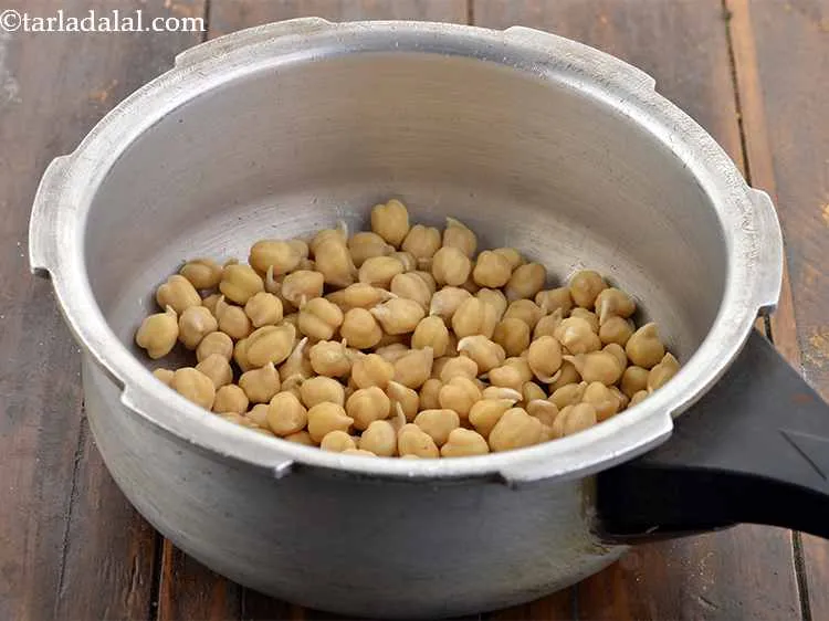 Step 15 – Put the soaked and drained chickpeas in a pressure cooker
