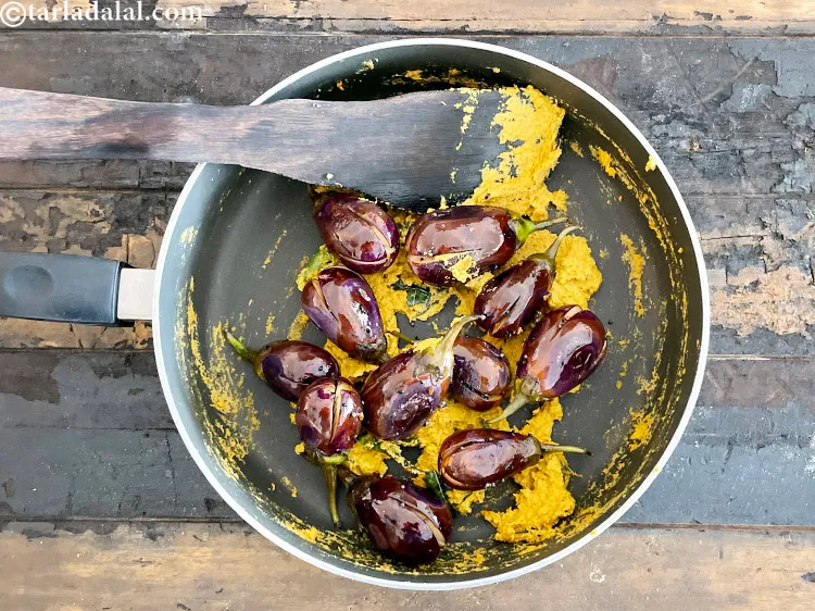 Step 39 – Add the cooked brinjals.