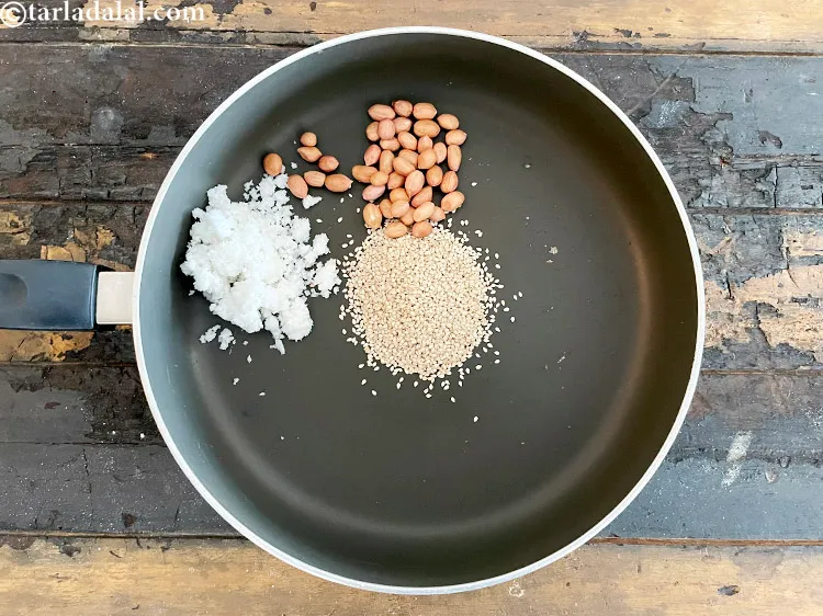 Step 9 – Add&nbsp;<meta charset="UTF-8" />2 tbsp&nbsp;<a href="glossary-raw-peanuts-kachi-mungfali-kachi-moongfali-847i">raw peanuts</a>.