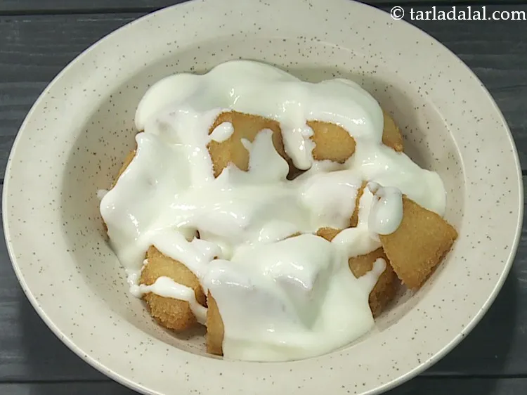 Step 7 – Top it with 5 tbsp of whisked curds. Ensure the curd is fresh and not …