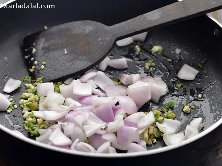 Step 12 – Add the onions. Instead of onions, you can make use of spring onion whites.
