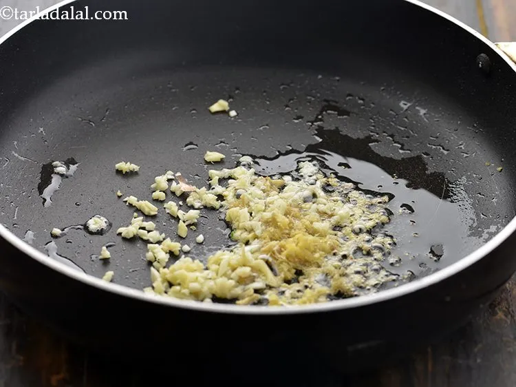 Step 9 – Add the garlic.