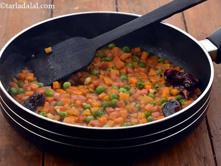 Step 11 – Mix well and cook on a medium flame for 1 to 2 minutes.