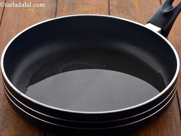 Step 3 – To make&nbsp;<strong>idli upma recipe | idli upma with leftover idli |&nbsp;healthy idli upma&nbsp;|&nbsp;</strong>heat the oil …