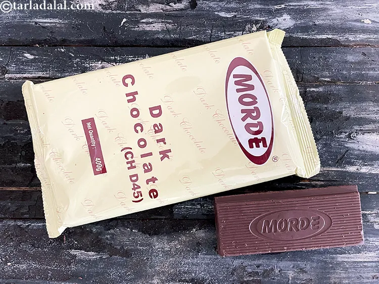 Step 3 – <meta charset="UTF-8" />This is what dark chocolate looks like.&nbsp;<strong>Dark Chocolate is made by processing a …