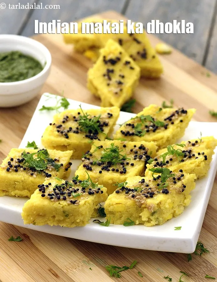 Step 28 – Serve&nbsp;<strong>makai dhokla recipe | Indian makai ka dhokla | Gujarati makai na dhokla</strong>&nbsp;hot with green …