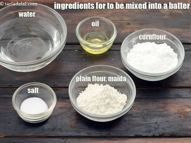 Step 3 – <strong>For the batter,&nbsp;</strong>1/2 cup&nbsp;<a href="https://www.tarladalal.com/glossary-plain-flour-maida-188i">plain flour (maida)</a>,&nbsp;1/4 cup&nbsp;<a href="https://www.tarladalal.com/glossary-cornflour-cornstarch-maize-starch-corn-flour-112i">cornflour</a>,&nbsp;1 tsp&nbsp;oil,&nbsp;salt&nbsp;to taste and&nbsp;<br /> 1/2 cup&nbsp;water.&nbsp;<br …