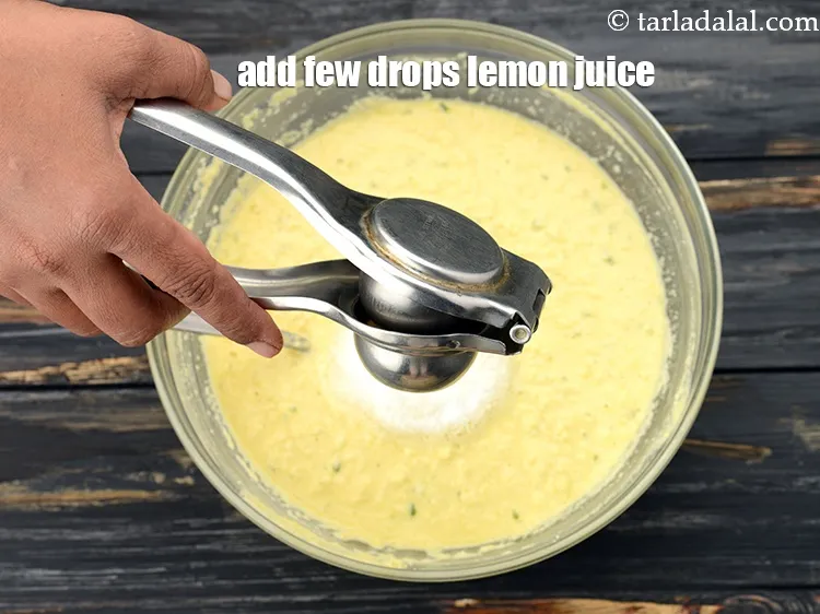 Step 13 – Add a few drops of&nbsp;<a href="https://www.tarladalal.com/glossary-lemon-juice-numbi-ka-ras-nimbu-ka-juice-471i">lemon juice</a>.&nbsp;