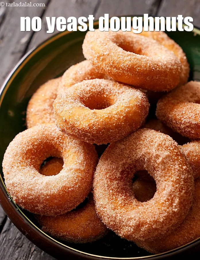 Step 23 – &nbsp;Serve <strong>eggless doughnuts</strong> immediately.<br /> &nbsp;