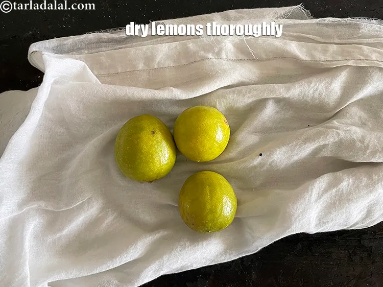 Step 8 – <meta charset="UTF-8" />Remove the cooked hot lemons from the pan and dry them. This will …
