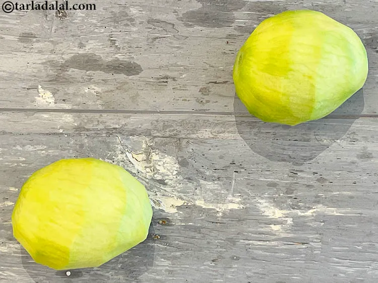 Step 8 – Peel them with the help of a peeler or a knife.