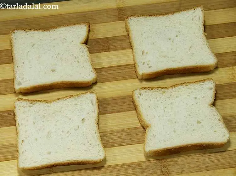 Step 10 – To make&nbsp;<strong>Pav Bhaji Masala Toast,&nbsp;</strong>first place all the bread slices on a clean, dry surface. …