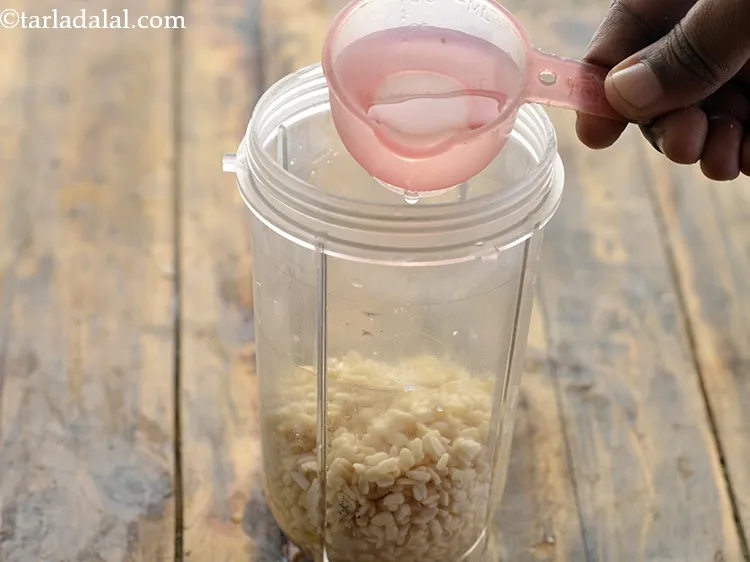 Step 15 – In the mixer jar, add the urad dal, fenugreek seeds and approx. &frac14; cup of …