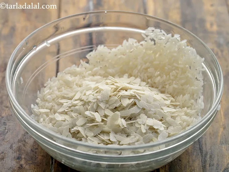 Step 4 – Drain the rice and add poha. Poha help in making soft and fluffy idlis. We …