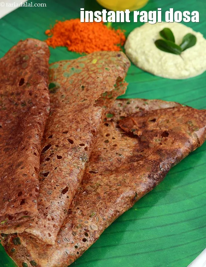 Step 25 – Serve Instant ragi rava dosa hot with coconut chutney and sambhar.
