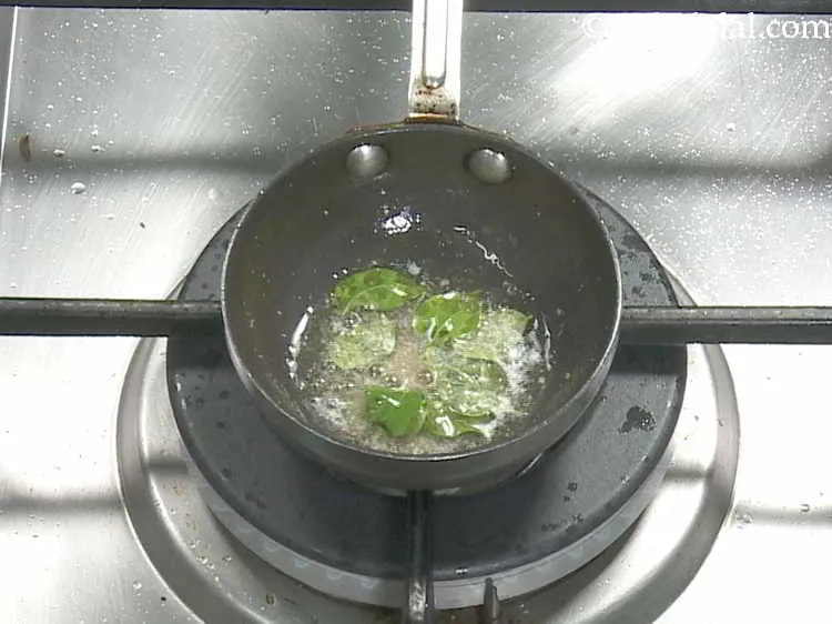 Step 12 – Once the seeds crackles, add the hing and curry leaves and saut? on a medium …