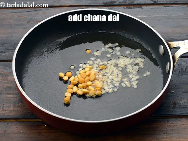 Step 19 – Add 1/2 tsp&nbsp;<a href="https://www.tarladalal.com/glossary-chana-dal-split-bengal-gram-285i">chana dal (split bengal gram)</a>.&nbsp;