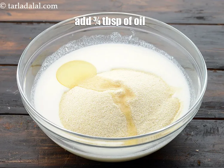 Step 8 – Add &frac34; tbsp <a href="https://www.tarladalal.com/glossary-oil-671i">oil</a>.&nbsp;