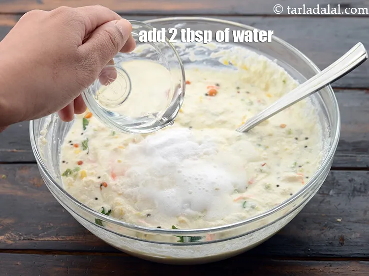 Step 27 – Add 2 tbsp of water over it.