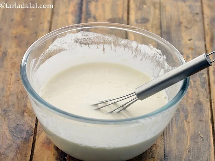 Step 7 – Whisk well to form a lump-free, thick batter. Keep aside.