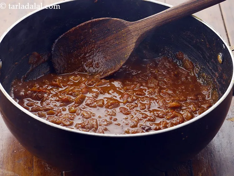 Step 27 – Mix well and cook on a medium flame for 5 minutes, while mashing it lightly …