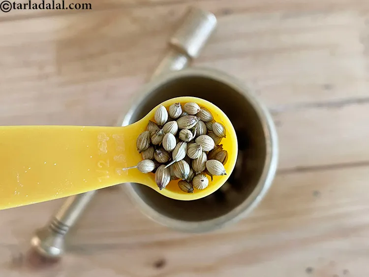 Step 7 – Add&nbsp;<meta charset="UTF-8" />1 tsp&nbsp;<a href="glossary-coriander-seeds-dhania-ke-beej-dhania-seeds-akha-dhania-371i">coriander (dhania) seeds</a>.